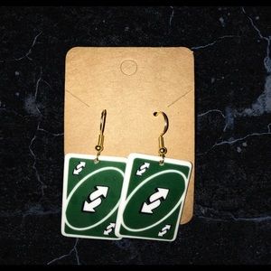 Green uno reverse card earring non-tarnish.